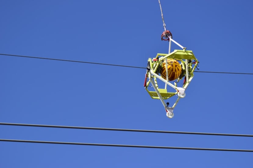 Picture of robotic installation of power line markers